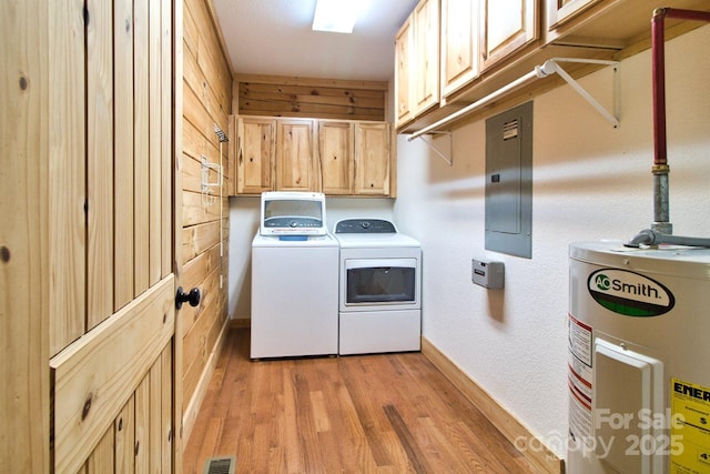 496 Moonlight Pass, Union Mills, NC 28167 - washroom featuring cabinet space, electric panel, electric water heater, washing machine and dryer, and light wood-type flooring