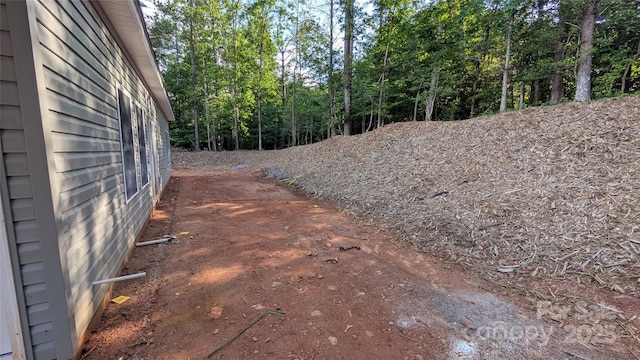 6386 Cathedral Dr, Granite Falls, NC 28601 - view of yard featuring a forest view