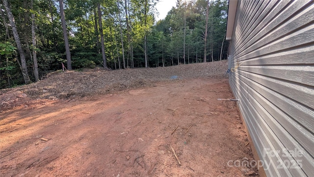 6386 Cathedral Dr, Granite Falls, NC 28601 - view of yard featuring a wooded view