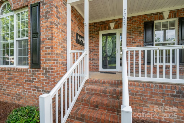 7255 Orchard Path Dr, Clemmons, NC 27012 - entrance to property with brick siding and a porch