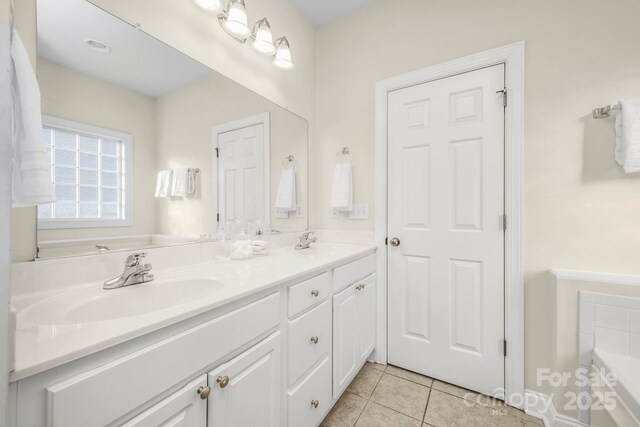 7255 Orchard Path Dr, Clemmons, NC 27012 - full bath featuring double vanity, tile patterned floors, and a tub to relax in