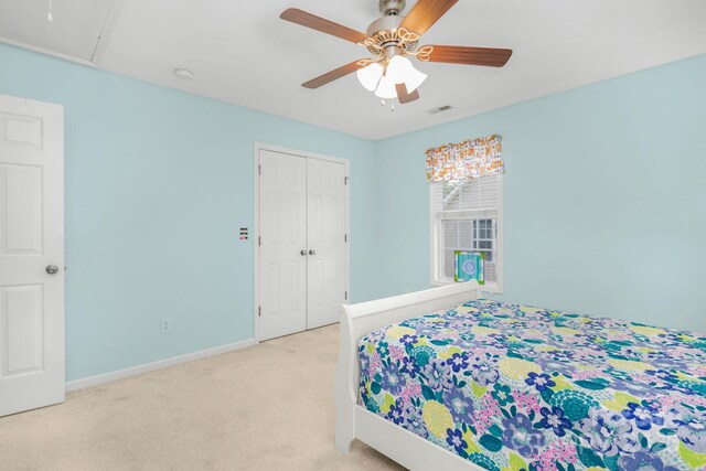7255 Orchard Path Dr, Clemmons, NC 27012 - carpeted bedroom with a closet, ceiling fan, baseboards, and attic access