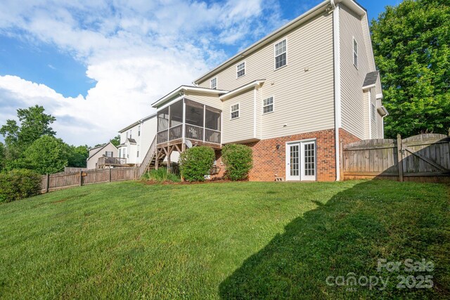 7255 Orchard Path Dr, Clemmons, NC 27012 - back of house with a sunroom, brick siding, stairs, french doors, and a gate