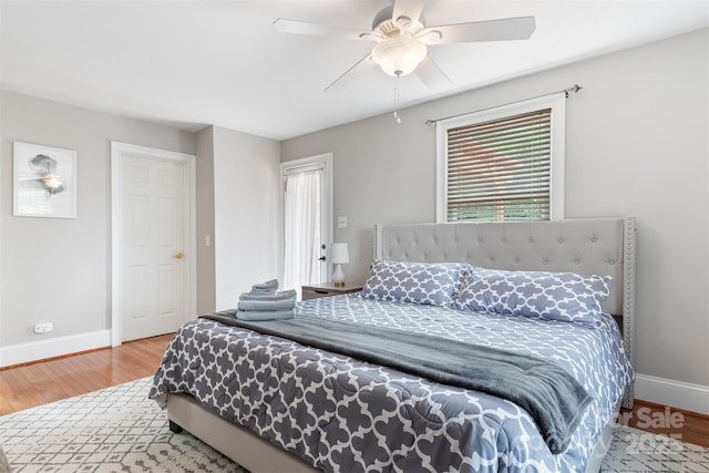 6294 Southlake Dr, Hickory, NC 28601 - bedroom featuring wood finished floors, baseboards, and a ceiling fan
