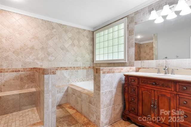 6294 Southlake Dr, Hickory, NC 28601 - bathroom with tile walls, ornamental molding, a garden tub, and vanity