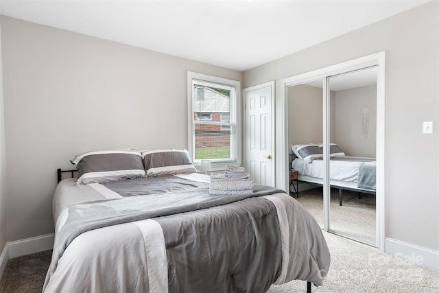 6294 Southlake Dr, Hickory, NC 28601 - carpeted bedroom with baseboards and a closet