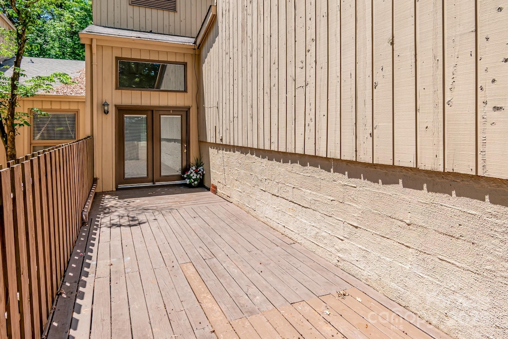4025 Ivystone Ct, Charlotte, NC 28277 - wooden terrace with french doors