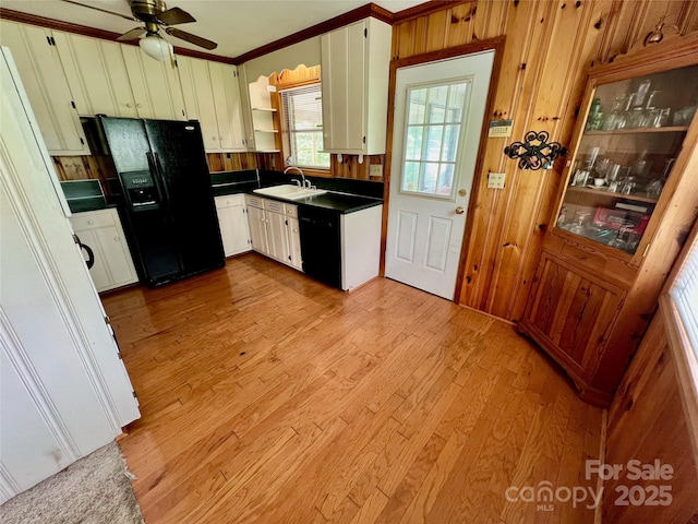 1585 Salem Church Rd, Lincolnton, NC 28092 - kitchen with a sink, black appliances, dark countertops, light wood-style flooring, and a ceiling fan