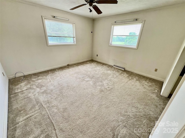 1585 Salem Church Rd, Lincolnton, NC 28092 - carpeted empty room with plenty of natural light, ceiling fan, and baseboards