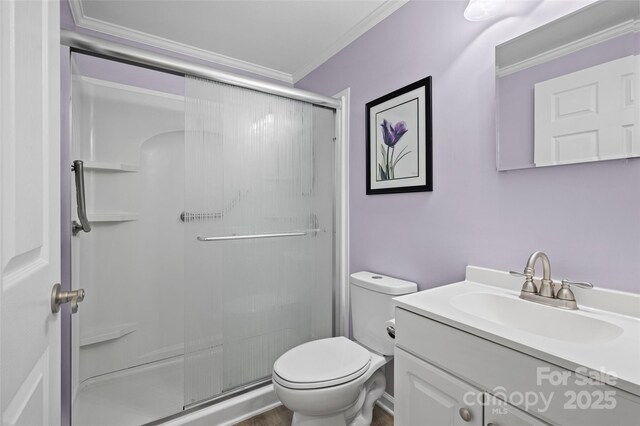 144 Stoneybrook Rd, Salisbury, NC 28147 - full bathroom featuring a stall shower, vanity, crown molding, and toilet