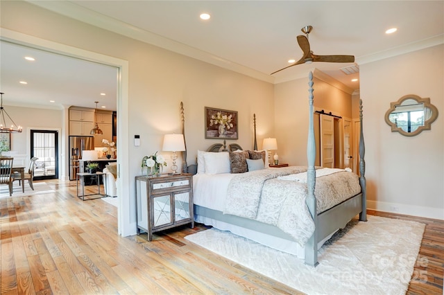 445 Sundown Rd, Mooresville, NC 28117 - bedroom with light wood-type flooring, stainless steel fridge, recessed lighting, crown molding, and a chandelier