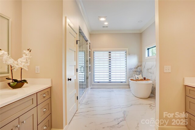 445 Sundown Rd, Mooresville, NC 28117 - bathroom with vanity, a freestanding tub, marble finish flooring, crown molding, and a shower stall