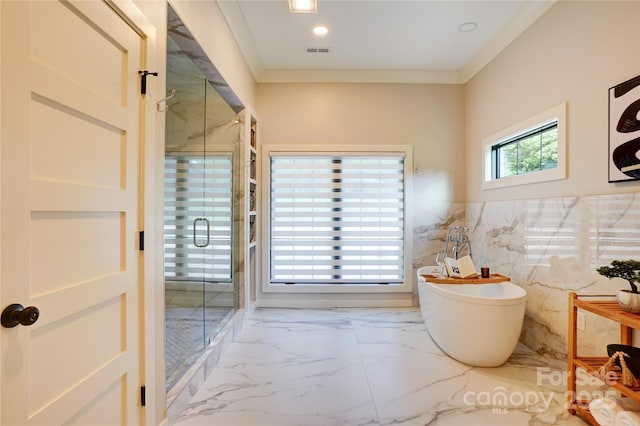 445 Sundown Rd, Mooresville, NC 28117 - full bathroom with a marble finish shower, a freestanding tub, marble finish floors, a wainscoted wall, and ornamental molding