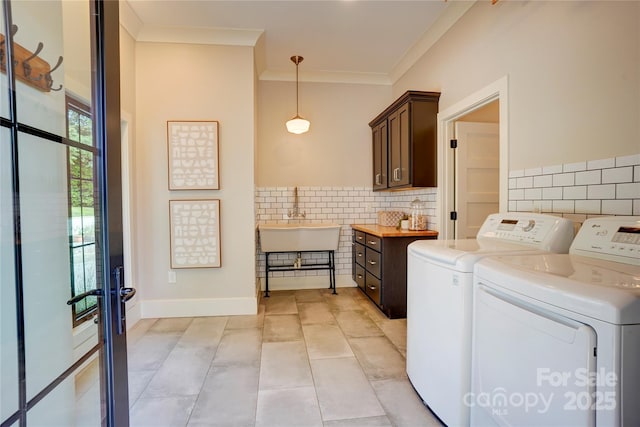 445 Sundown Rd, Mooresville, NC 28117 - laundry area with independent washer and dryer, light tile patterned floors, crown molding, and french doors