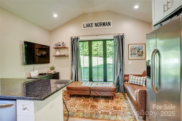445 Sundown Rd, Mooresville, NC 28117 - living room with vaulted ceiling, recessed lighting, and wood finished floors