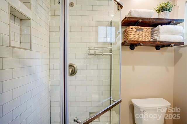 445 Sundown Rd, Mooresville, NC 28117 - bathroom with a stall shower and toilet