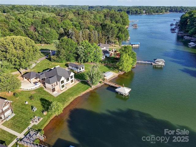 445 Sundown Rd, Mooresville, NC 28117 - aerial view of property's location with a heavily wooded area and a large body of water