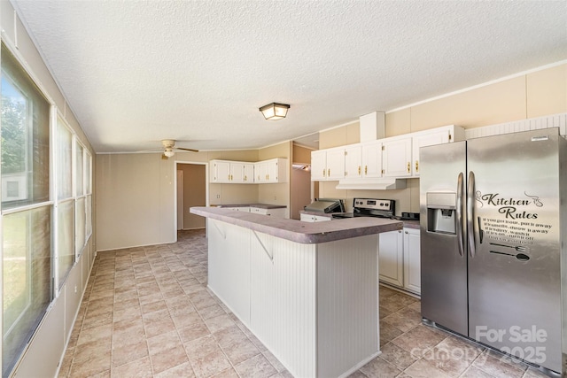 3585 Woodstream Dr, Maiden, NC 28650 - kitchen with appliances with stainless steel finishes, under cabinet range hood, a ceiling fan, a kitchen island, and white cabinets