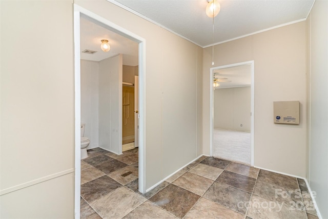 3585 Woodstream Dr, Maiden, NC 28650 - hallway with stone finish flooring and crown molding