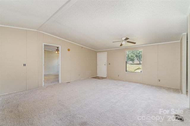 3585 Woodstream Dr, Maiden, NC 28650 - empty room with a ceiling fan, lofted ceiling, carpet floors, and ornamental molding