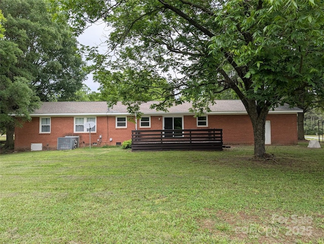 5628 White Store Rd, Wingate, NC 28174 - back of property featuring crawl space, brick siding, a lawn, cooling unit, and a deck