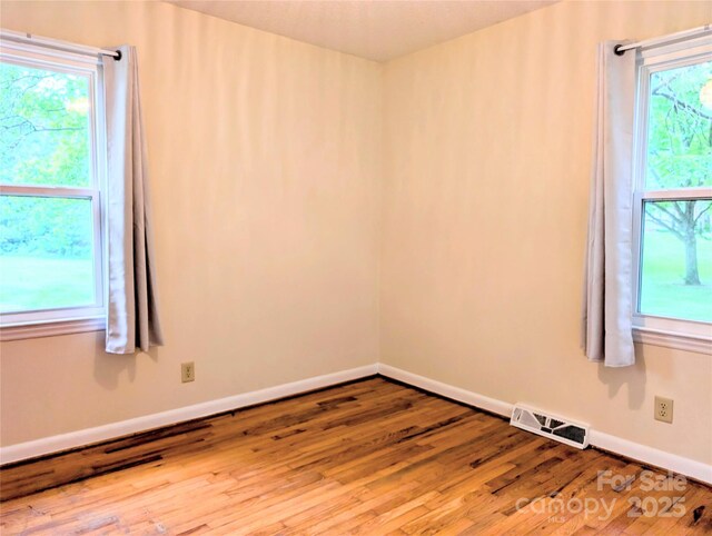 5628 White Store Rd, Wingate, NC 28174 - unfurnished room featuring wood finished floors and baseboards