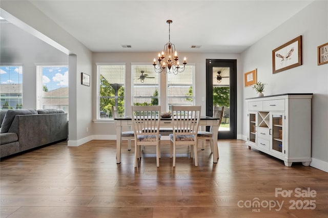 1478 Imperial Ct, York, SC 29745 - dining room featuring a chandelier, hardwood / wood-style floors, and baseboards