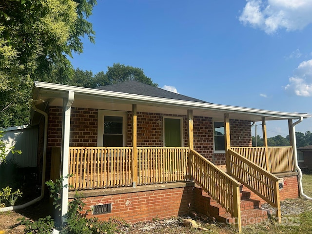 360 Ledbetter Rd, Spindale, NC 28160 - view of front of home with covered porch, brick siding, and stairs