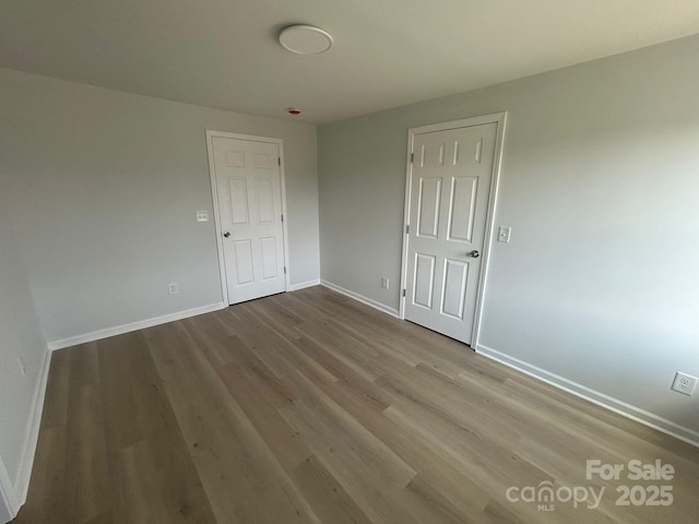 360 Ledbetter Rd, Spindale, NC 28160 - unfurnished room with baseboards and wood finished floors