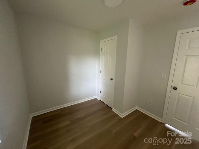 360 Ledbetter Rd, Spindale, NC 28160 - spare room featuring dark wood finished floors and baseboards