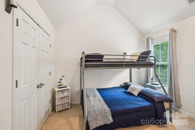 5021 Meadow Woods Dr, Lowell, NC 28098 - bedroom with carpet floors, vaulted ceiling, baseboards, and a closet