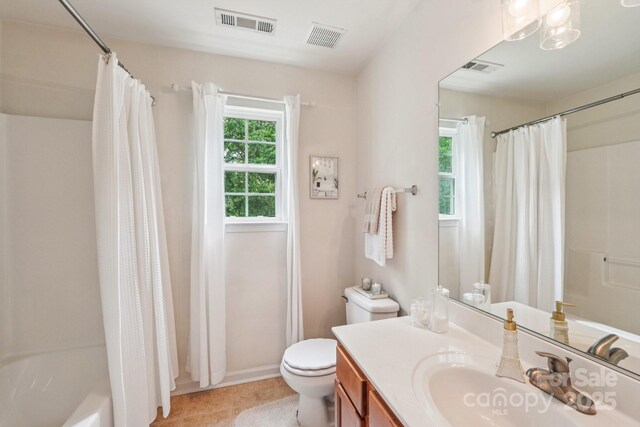 5021 Meadow Woods Dr, Lowell, NC 28098 - bathroom with vanity, toilet, shower / bath combo, tile patterned floors, and baseboards