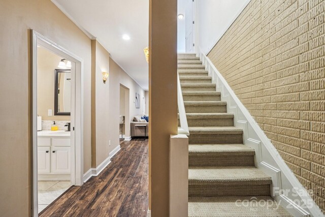 5021 Meadow Woods Dr, Lowell, NC 28098 - stairs with wood finished floors and baseboards