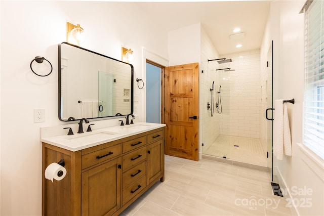 8340 Brief Rd, Mint Hill, NC 28227 - bathroom featuring a shower stall, double vanity, and tile patterned floors