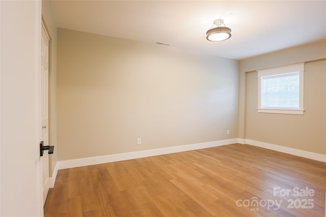 8340 Brief Rd, Mint Hill, NC 28227 - unfurnished room with light wood-style floors and baseboards