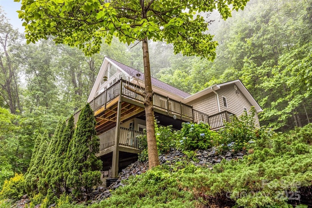 350 Mckissick Rd, Flat Rock, NC 28731 - back of house with a deck and a forest view