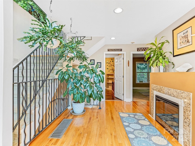 350 Mckissick Rd, Flat Rock, NC 28731 - foyer featuring wood finished floors, baseboards, recessed lighting, and a tiled fireplace