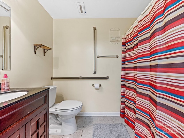 350 Mckissick Rd, Flat Rock, NC 28731 - full bathroom with tile patterned floors, toilet, vanity, baseboards, and a shower with curtain