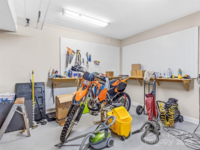 350 Mckissick Rd, Flat Rock, NC 28731 - garage featuring a workshop area and baseboards