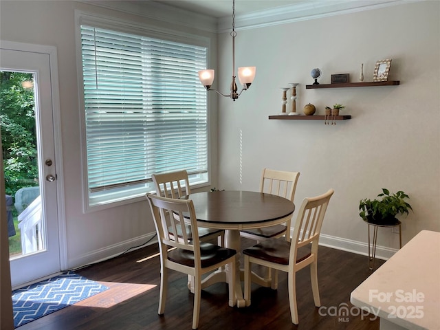 5005 Blue Serenity Ct, Denver, NC 28037 - dining room with a chandelier, healthy amount of natural light, ornamental molding, and dark wood finished floors