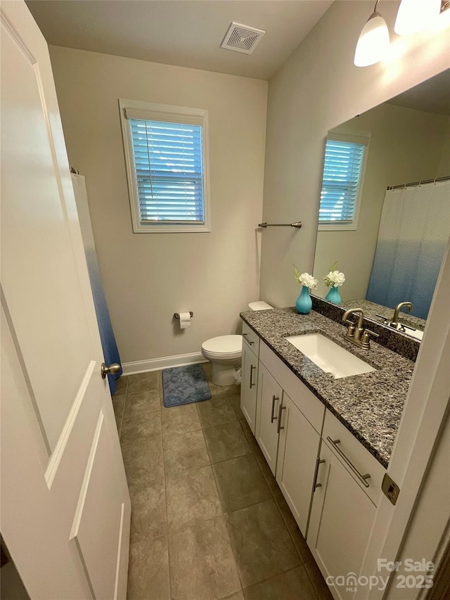 5005 Blue Serenity Ct, Denver, NC 28037 - full bathroom with vanity, plenty of natural light, toilet, and tile patterned flooring