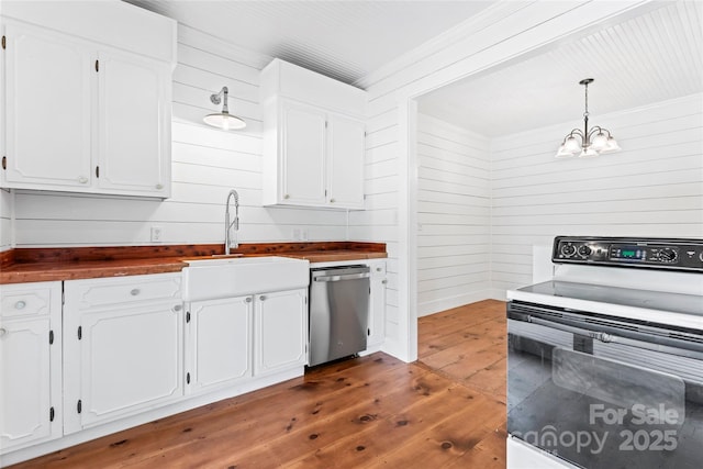 233 Sellars Rd, Kings Mountain, NC 28086 - kitchen with stainless steel dishwasher, electric stove, a sink, hardwood / wood-style flooring, and wooden walls