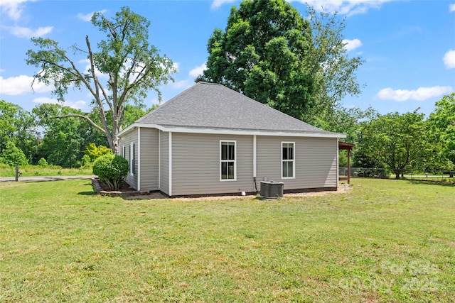 233 Sellars Rd, Kings Mountain, NC 28086 - rear view of property with central AC, a yard, and a shingled roof