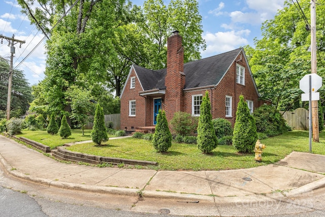 1400 Matheson Ave, Charlotte, NC 28205 - view of front of home featuring brick siding, roof with shingles, and a chimney