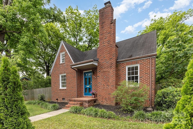 1400 Matheson Ave, Charlotte, NC 28205 - view of front facade featuring brick siding, a chimney, and a shingled roof