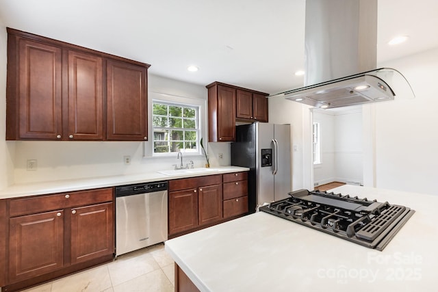 1400 Matheson Ave, Charlotte, NC 28205 - kitchen featuring stainless steel appliances, island exhaust hood, a sink, light countertops, and recessed lighting