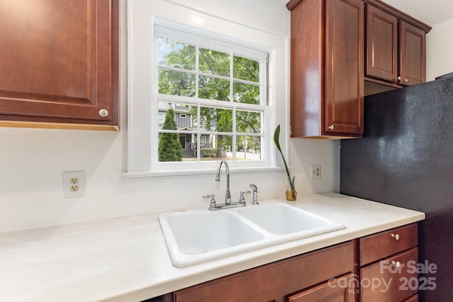 1400 Matheson Ave, Charlotte, NC 28205 - kitchen featuring a sink, plenty of natural light, light countertops, and freestanding refrigerator