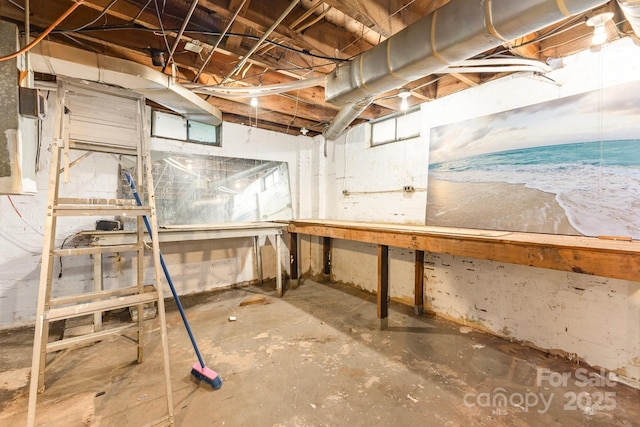 1400 Matheson Ave, Charlotte, NC 28205 - unfinished basement featuring a workshop area