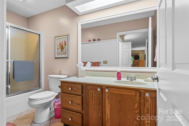 903 Independence Trl, Morganton, NC 28655 - full bathroom with vanity, toilet, tile patterned flooring, and shower / bath combination with glass door