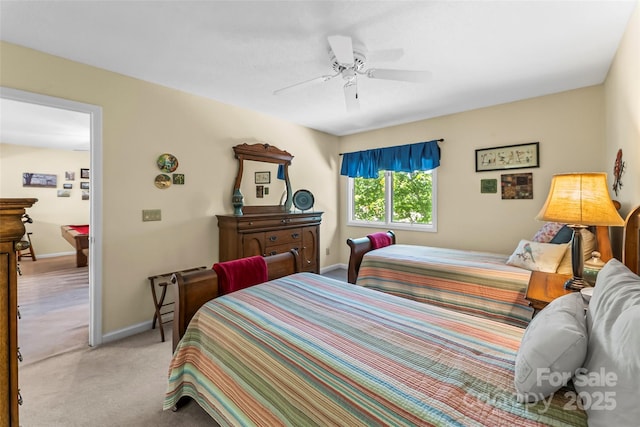 903 Independence Trl, Morganton, NC 28655 - bedroom with light carpet, baseboards, and a ceiling fan